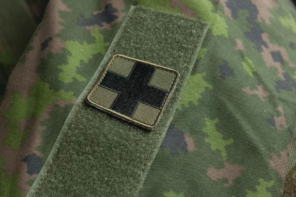 Varusteleka Tunnukset ^ Lääkintämerkki