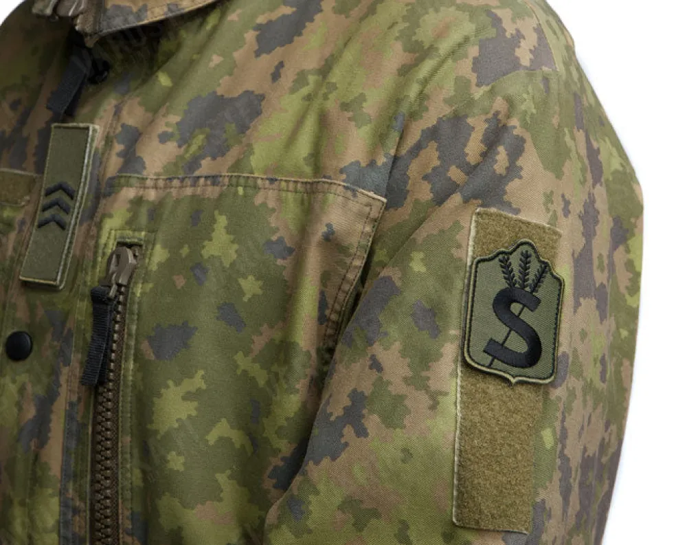 Varusteleka Tunnukset ^ Suojeluskunnan hihamerkki, kenttävärit